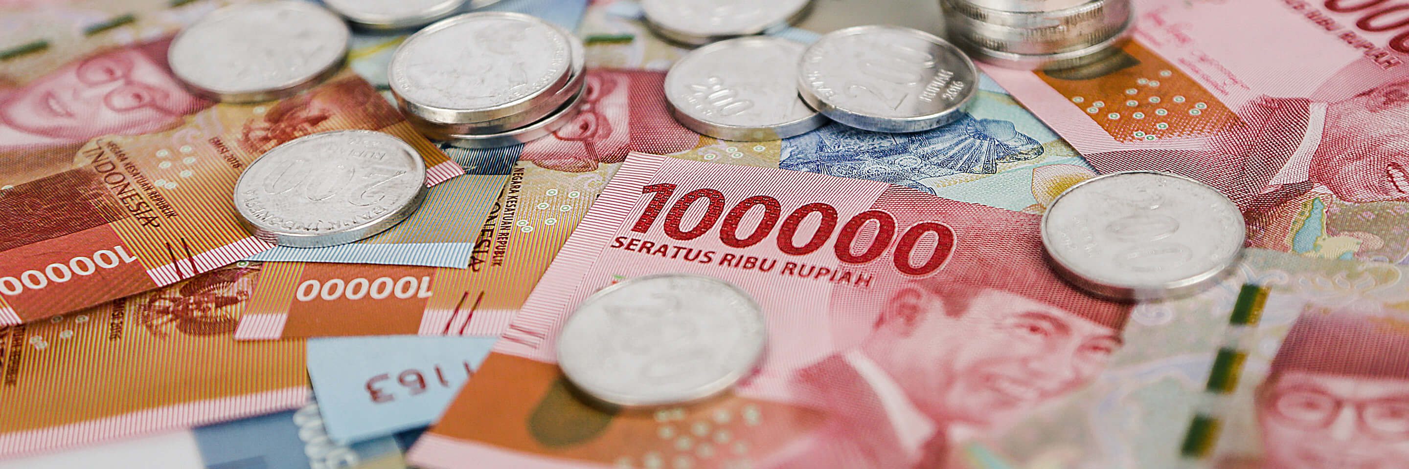 Bunch random indonesian rupiah currencies form side view