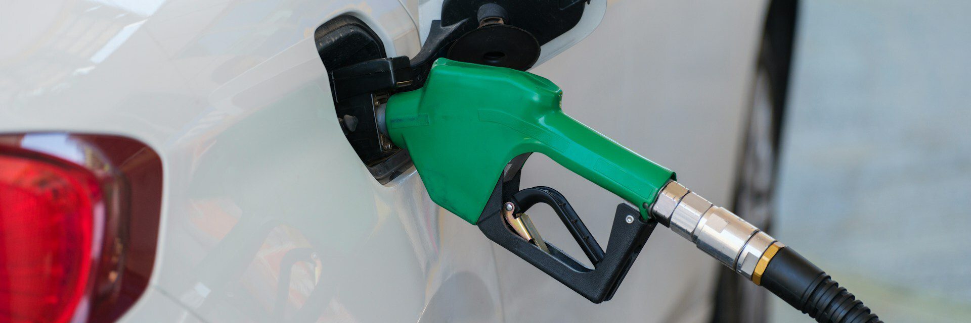 Refueling a white car