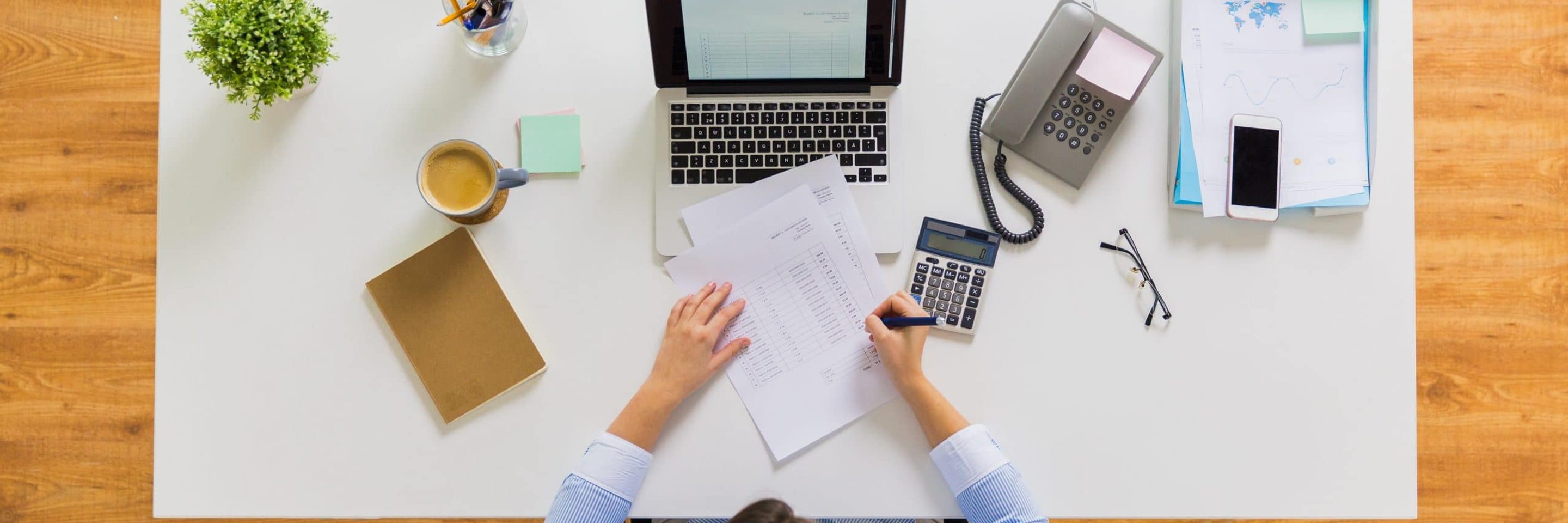 Businesswoman with tax report at office PXYQ8 FP scaled