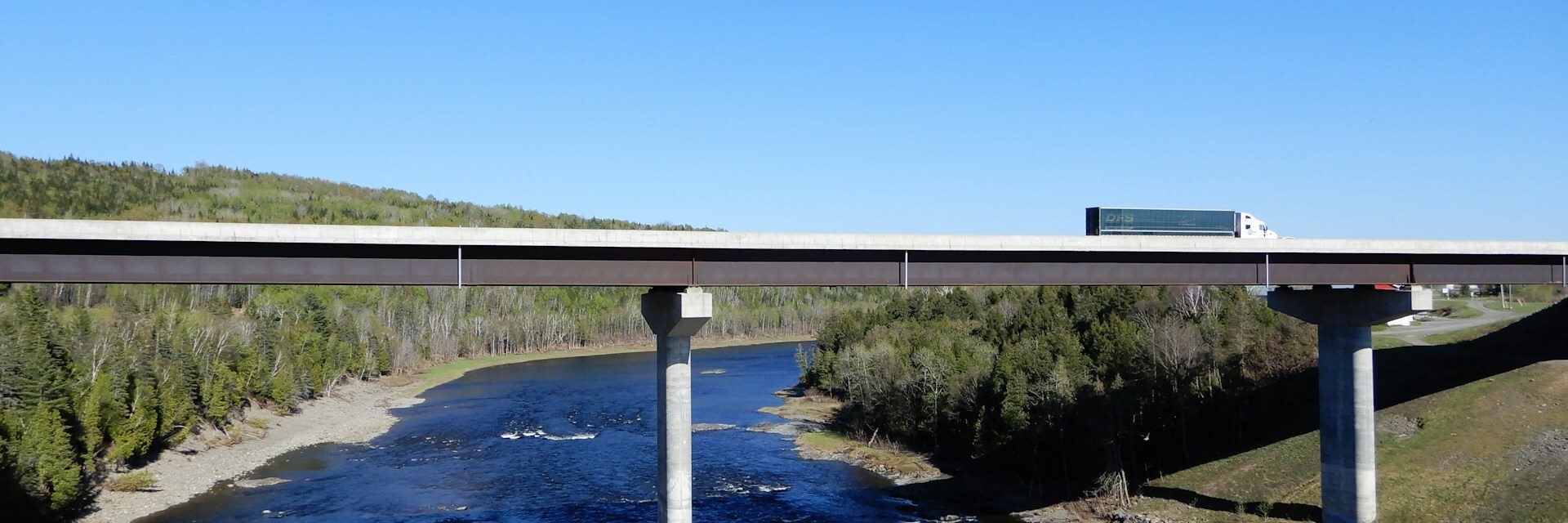 Supply chain lorry on a bridge