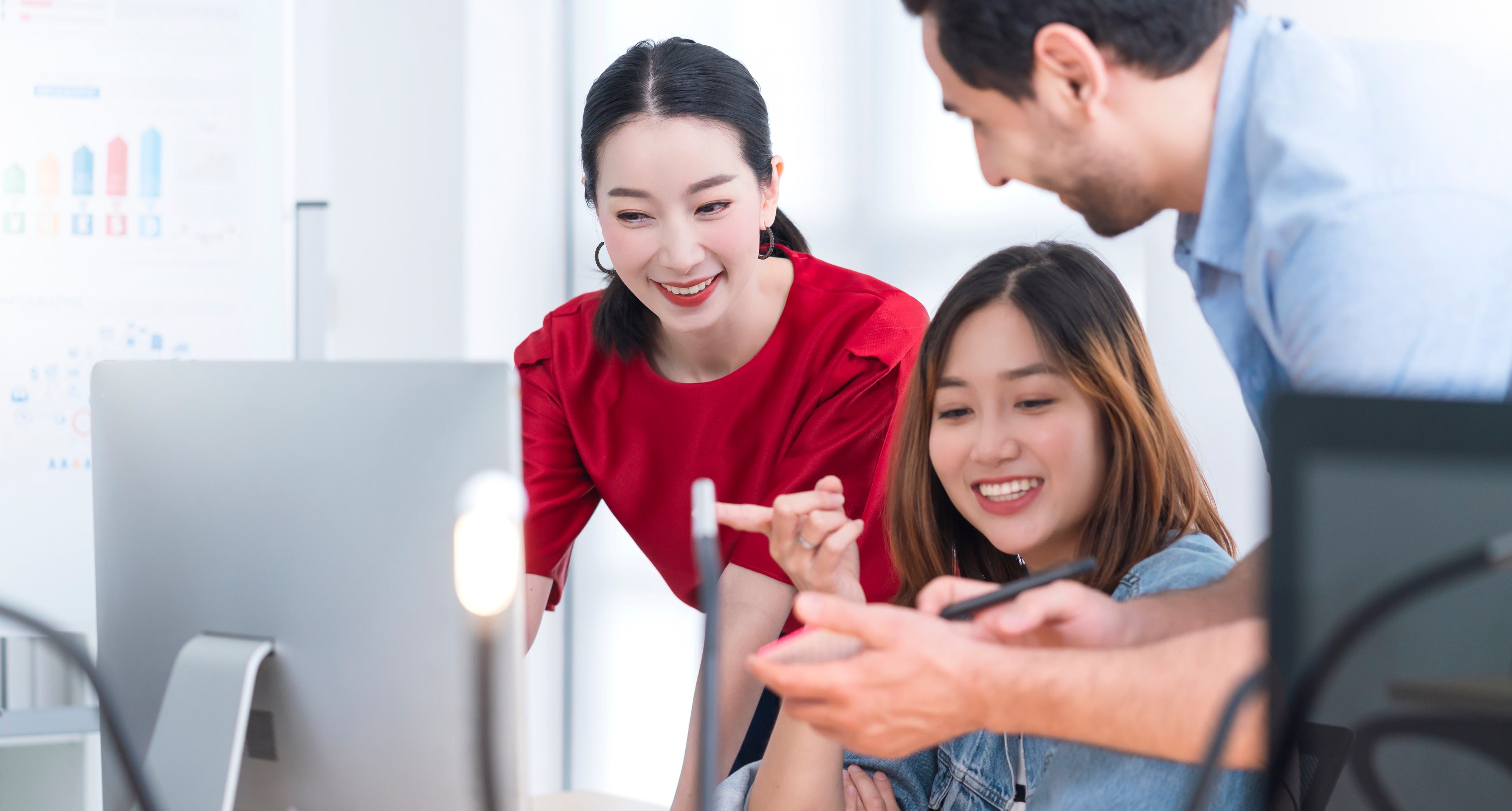 Asian colleague male female friend casual dress meeting consult work together with fun happiness successful brainstorm workplace business partners relation ideas concept