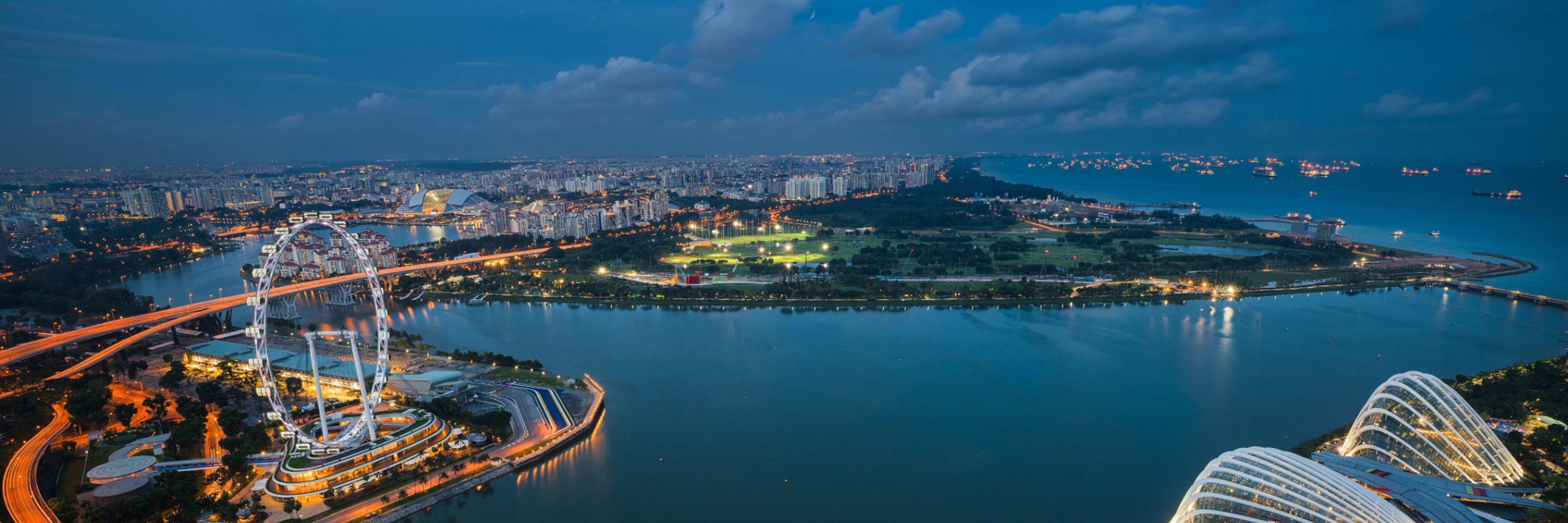 singapore skyline evening mbs gardens by the bay singapore flyer