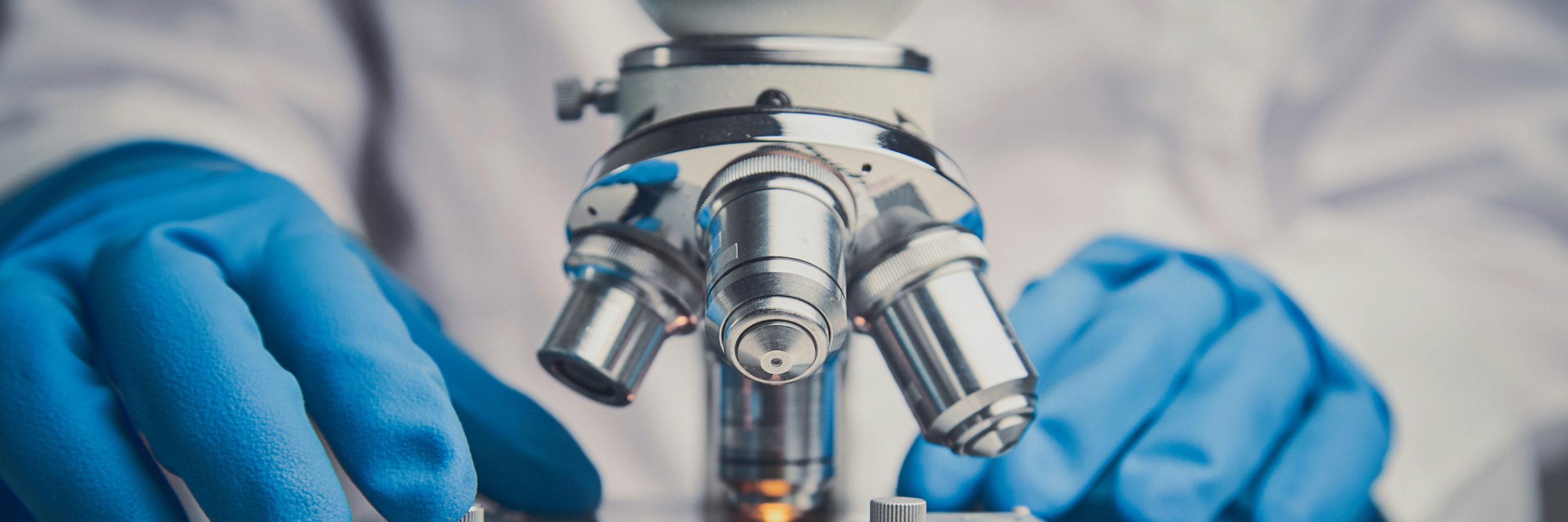 Life sciences lab coat microscope scientific